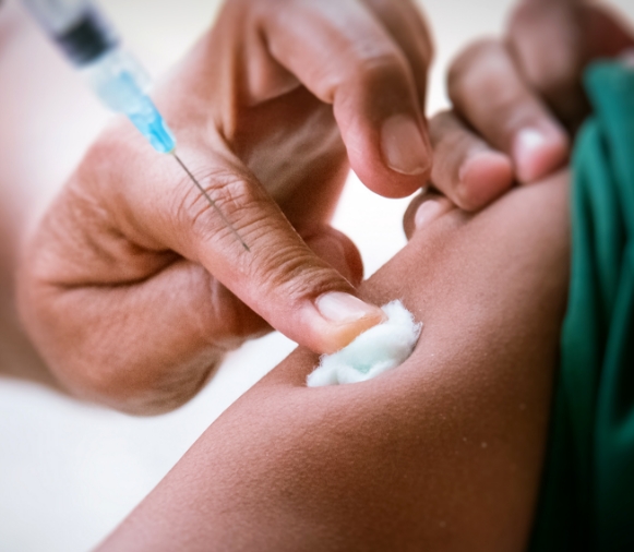 Person receiving typhoid fever vaccination at lawton pharmacy